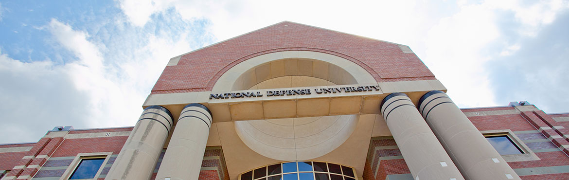 National Defense University red brick building with columned entrance and triangular pediment