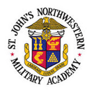 Official military academy crest with golden eagle, quartered shield, and Laborare Ludere Orare motto ribbon