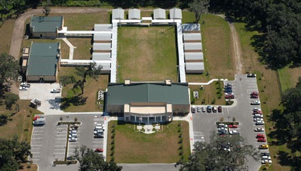 Aerial view of Summerlin Academy campus showing buildings, central courtyard, and parking areas